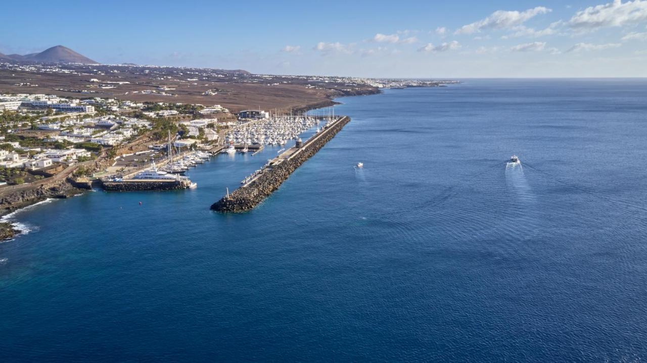 Secrets Lanzarote Resort & Spa - Adults Only Пуэрто-Калеро Экстерьер фото Aerial view of the port of Chania